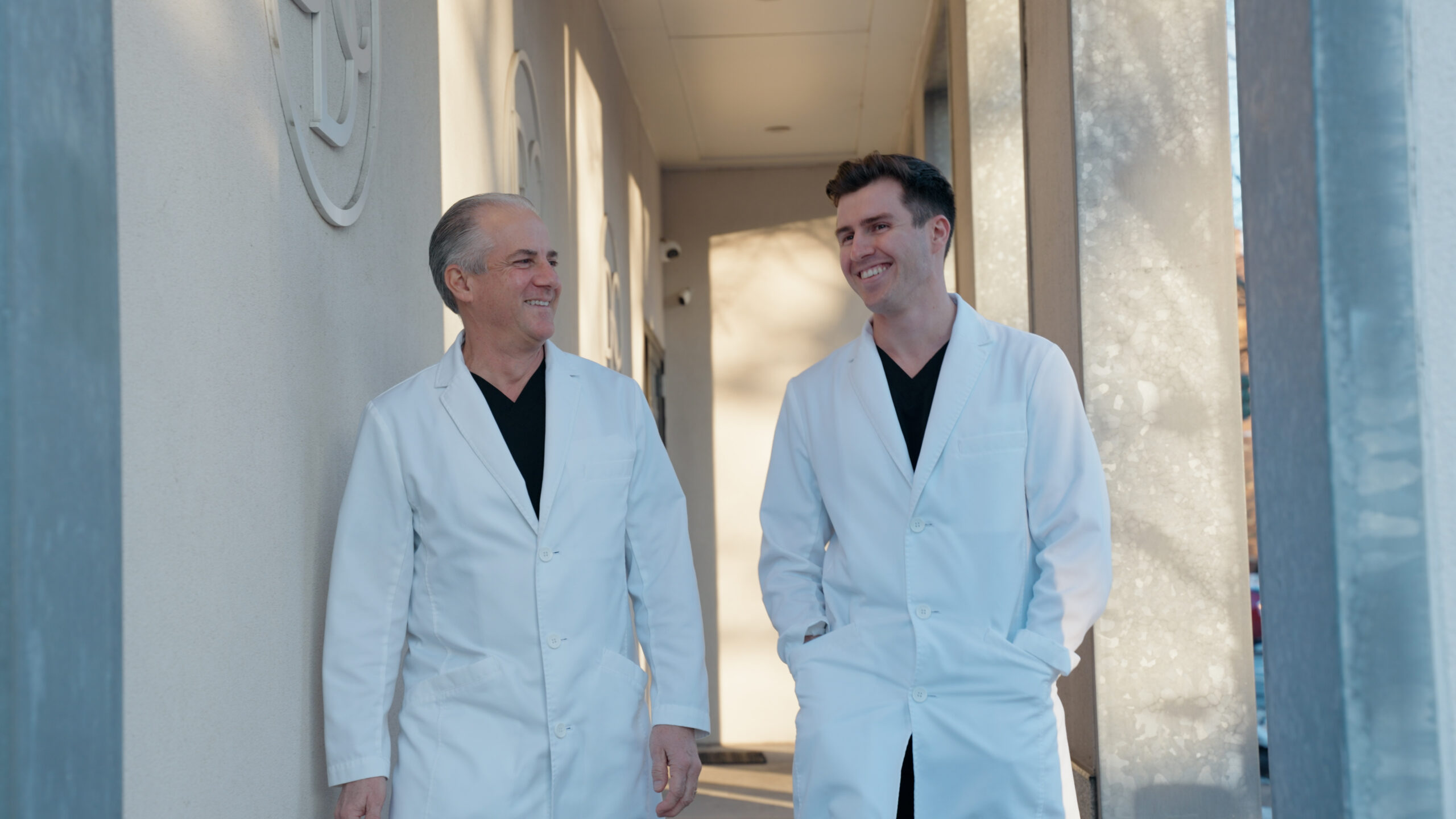 Dr. Dominic and Dr. Christopher D'Amico outside the dental office