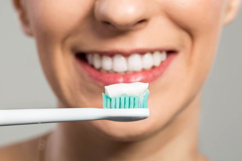 Using a Soft-Bristled Toothbrush for proper dental care for veneers
