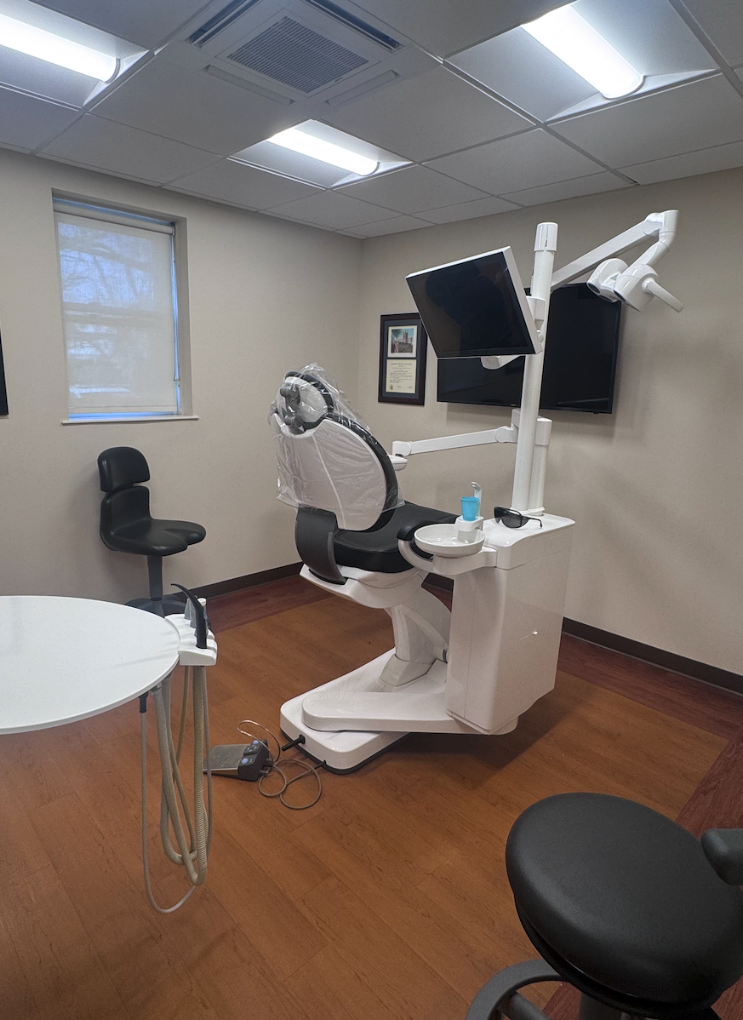 Dental hygienist providing patient care at D'Amico Dental Care Watertown
